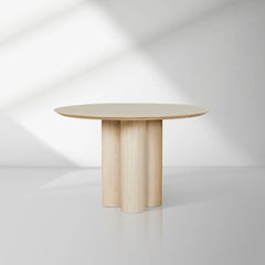 Reade Natural Ash Wood Round Dining Table with Sculptural Columnar Legs