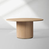 Caden Round Wood Dining Table with Sculptural Base & Antiqued Metal Plinth