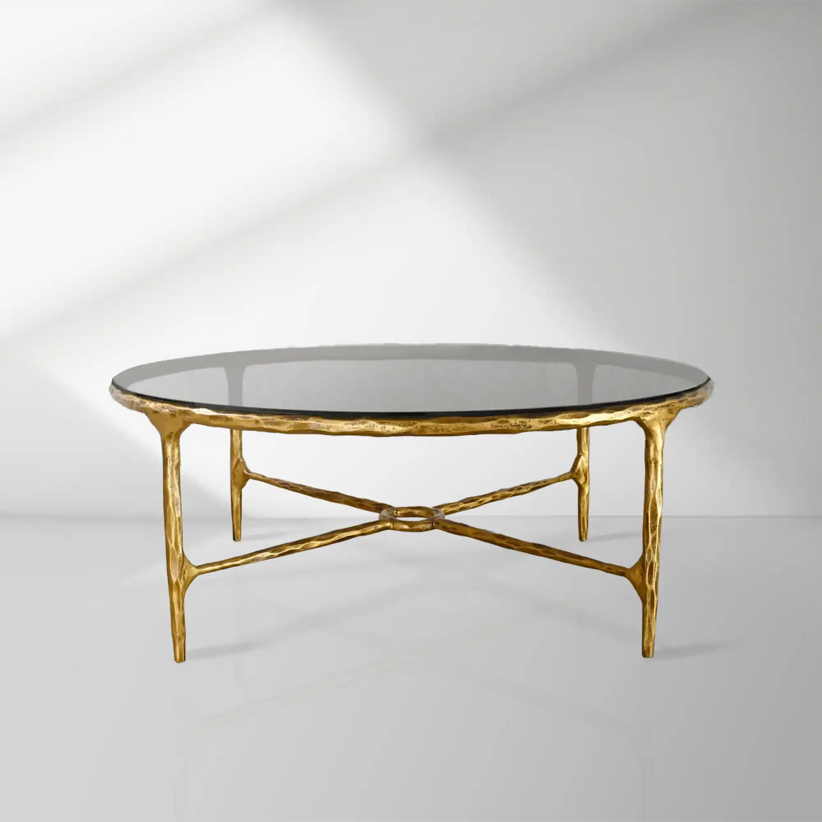 Thaddeus 36" 55" Round Hammered Metal and Glass Coffee Table
