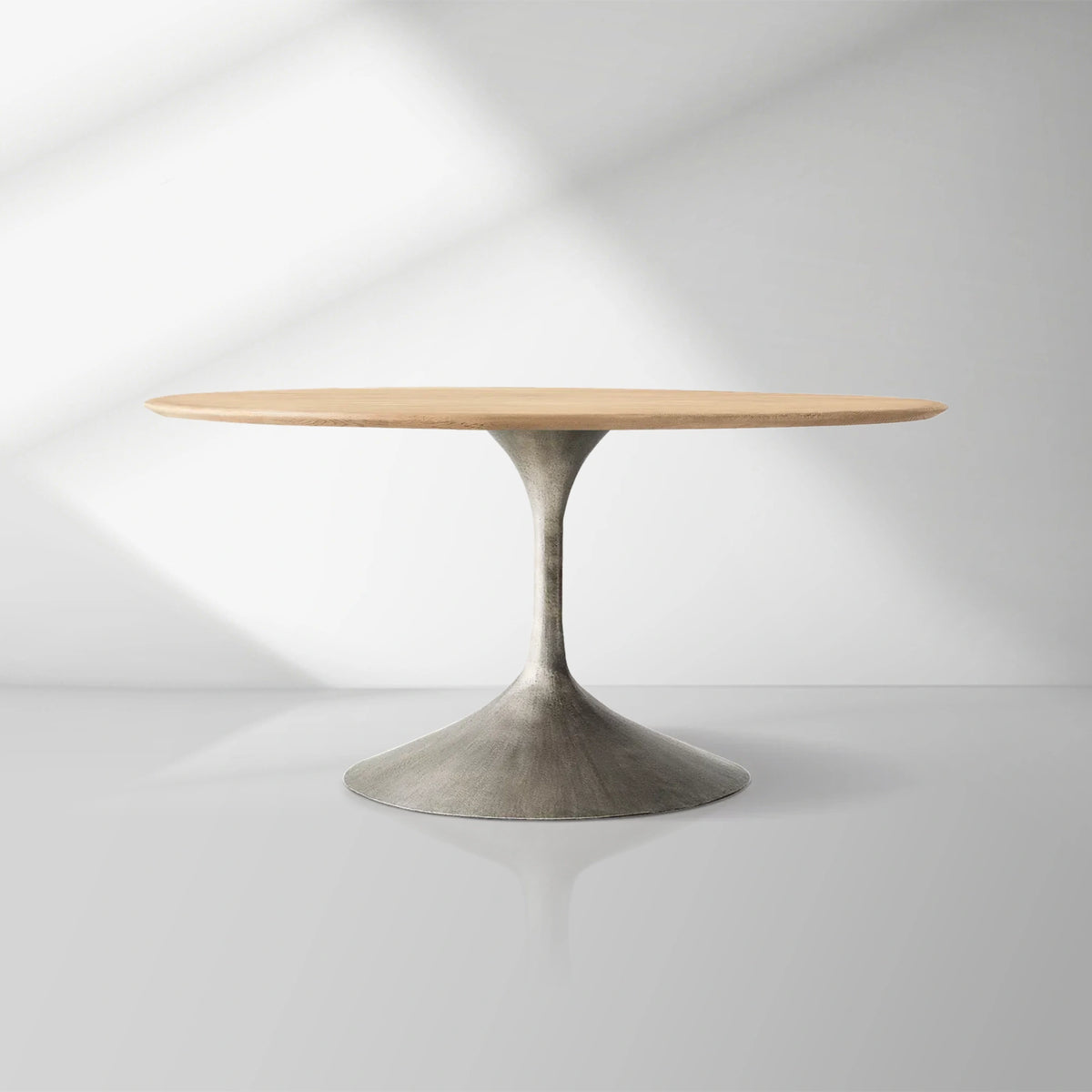 Aero Wood Round Dining Table with Arched Cast Steel Base
