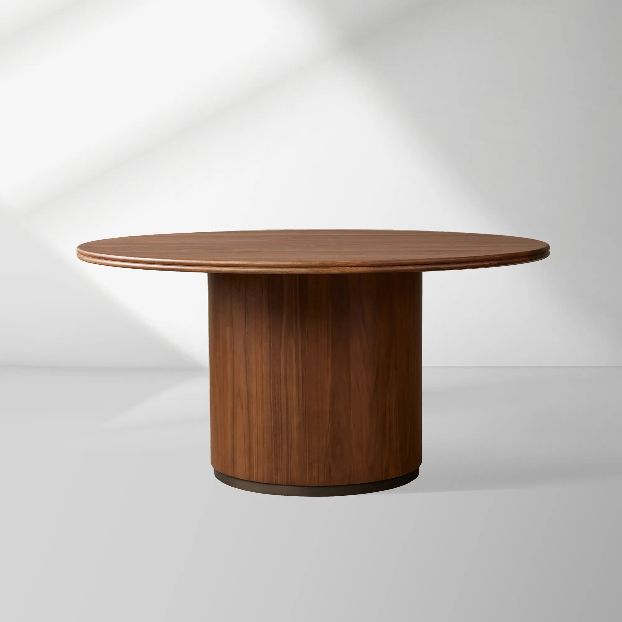 Caden Round Wood Dining Table with Sculptural Base & Antiqued Metal Plinth