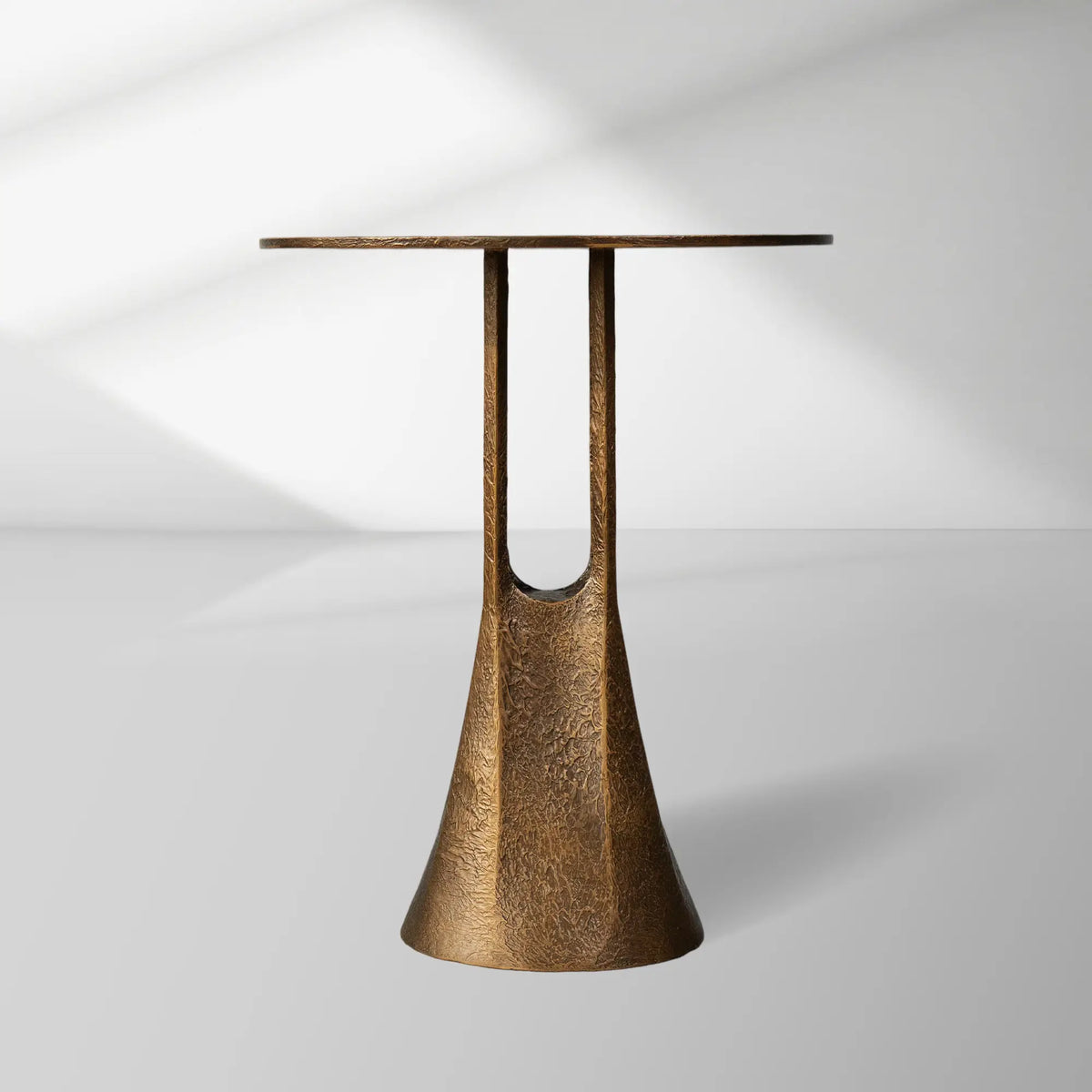 Sculptural Hammered Metal Side Table