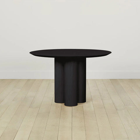 Reade Natural Ash Wood Round Dining Table with Sculptural Columnar Legs