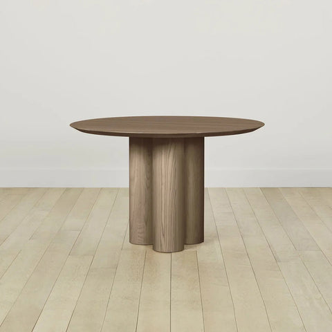 Reade Natural Ash Wood Round Dining Table with Sculptural Columnar Legs