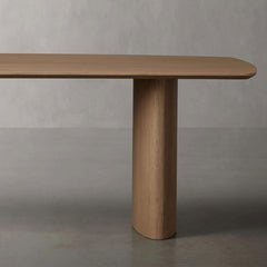 Theo Curved Dining Table Solid Oak Design with Sculptural Base